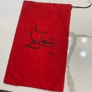 Christian Louboutin velvet slip bag